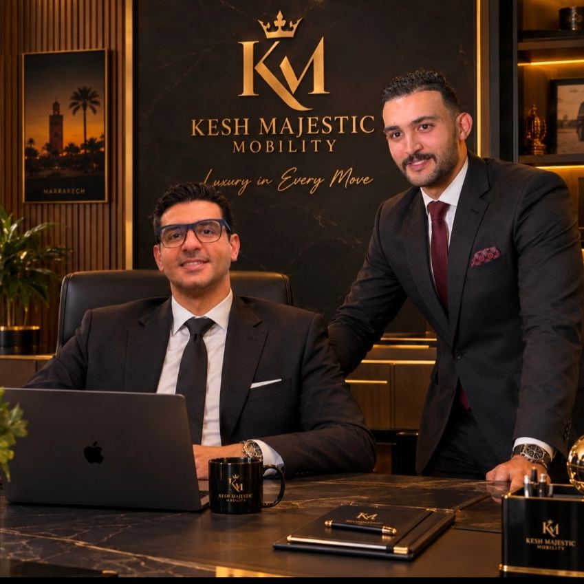 Amine Lamharrar and a colleague in the Kesh Majestic Mobility office in Marrakech